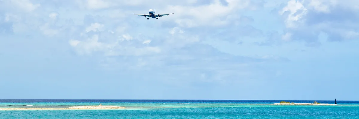 private jet over the ocean